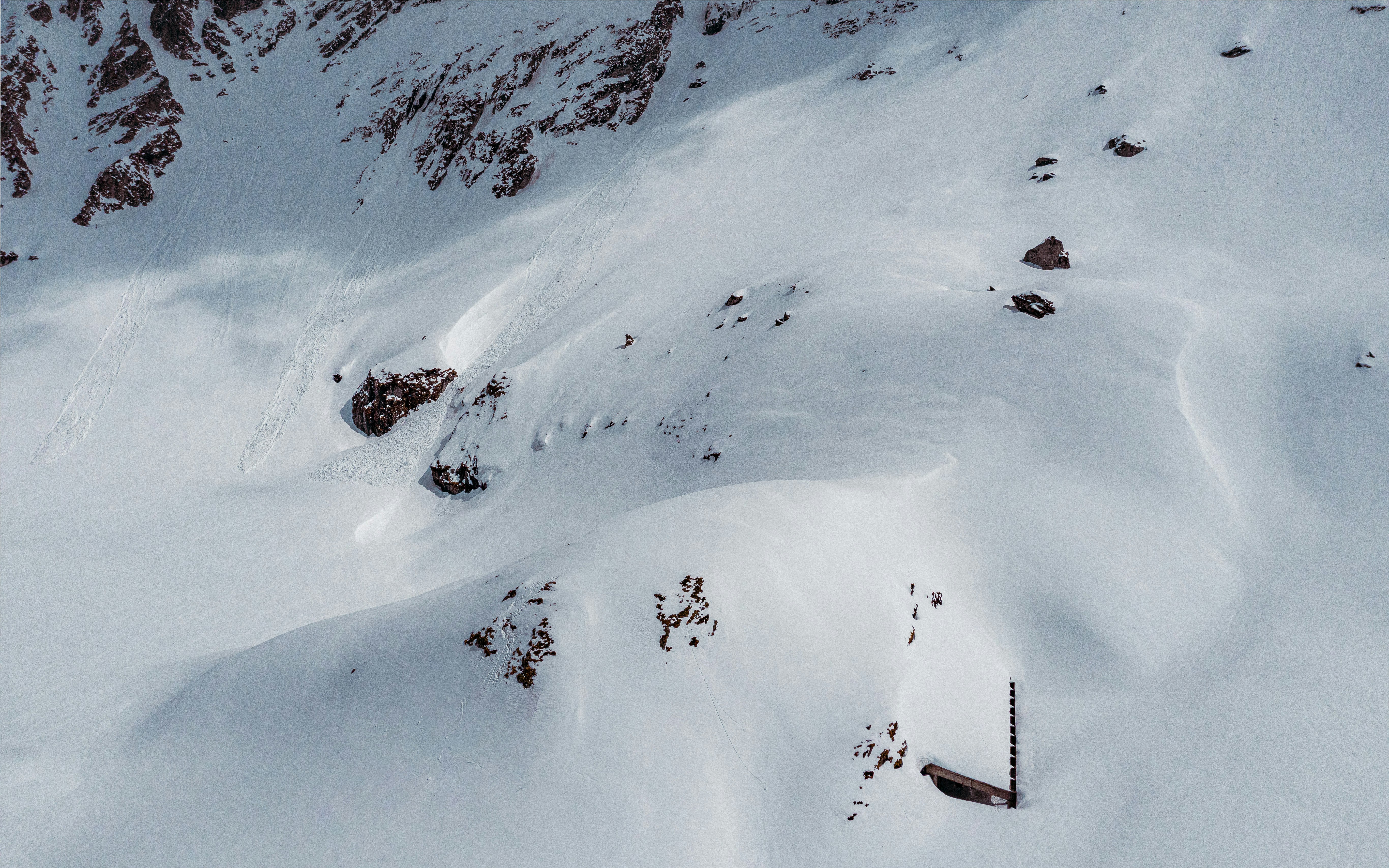 high-angle photography of mountain covered with snow